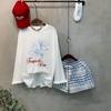 C S In The Room Tobi Flower prInTIng Long Sleeve T ShirT CheCk bandIng ShorTS