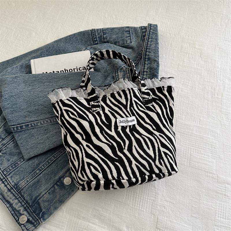 

Fashionable Canvas Bucket Bag For Women Featuring Comfortable Single Shoulder Strap Zebra Pattern