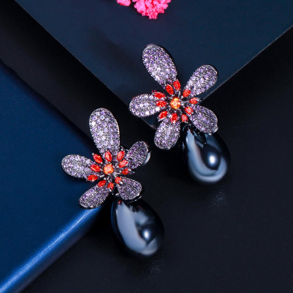 

Heavy Industry Gun Black Colored Diamond Petals Navy Blue Pearl Earrings Stamen Flower Zircon Earrings Stud Earrings