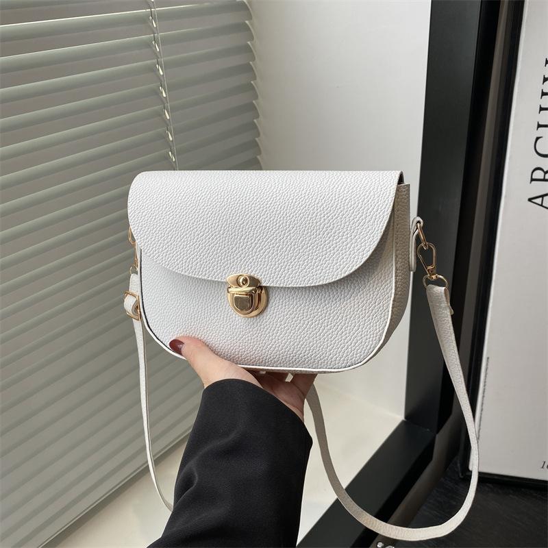 New casual versatile simple solid color temperament advanced texture simple retro shoulder messenger bag saddle bag