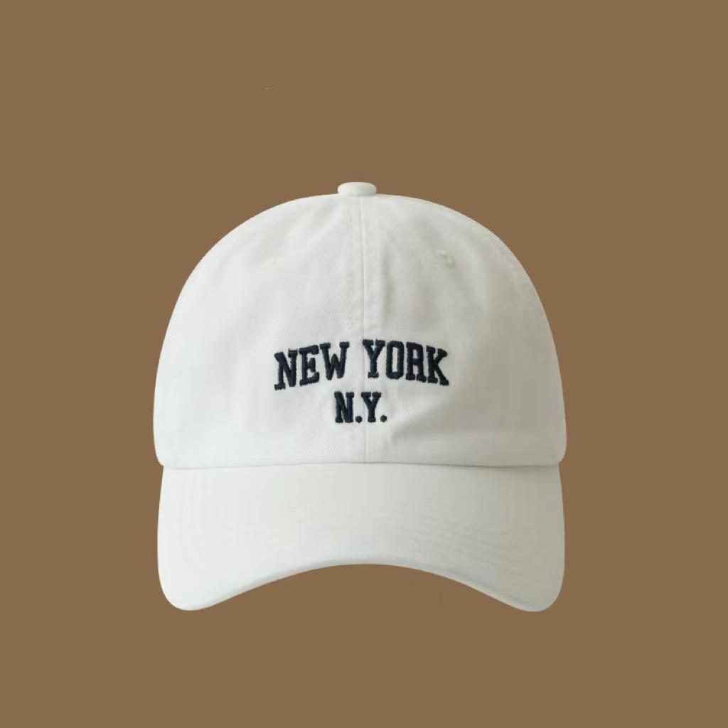 Female Baseball Cap Embroidered Soft Top Showing White Face with Small Navy Blue Baseball Cap for Women