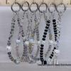 Minimalistisches AutoRad Strassstein Perlen Handy Handgelenk Lanyard Schlüsselanhänger für Frauen