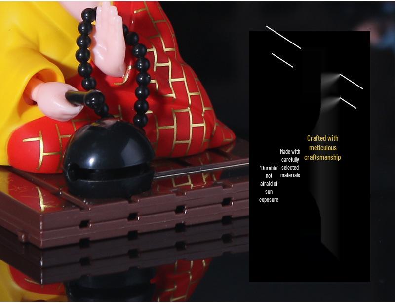 TikTok Solar Monk Car Ornament: Nodding Zen Chanting Figurine