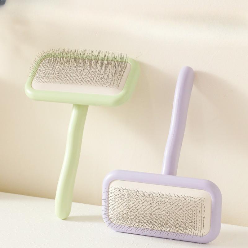 The Dog Comb Is More Comfortable Than The Bear Comb with A Special Puller Band and Airbag. The Pet Fluffy Beauty Needle Comb