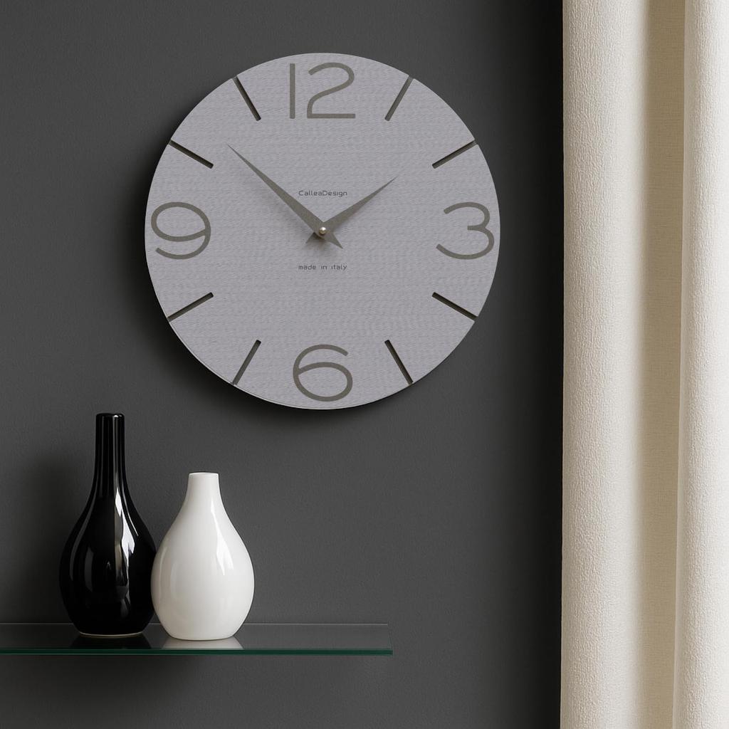 CalleaDesign 30cm kitchen wall clock in a smiley pinstripe pattern. The simple, round dial is easy to read. Metal hands at 11cm and 8cm.