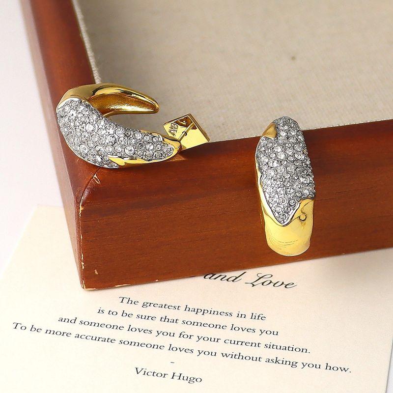 Designer Earrings with a Minimalist European and American Style, Featuring Unique Two-Tone Lines That Cross and Wrap Around Each Other, Open Bracelet C-Shaped Ab Two-Color Earrings