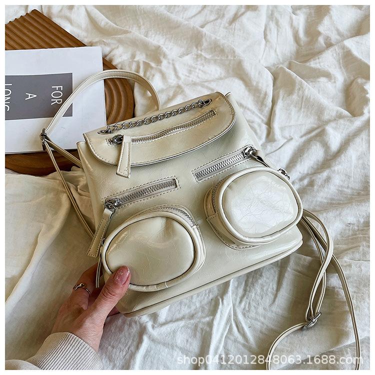 

Fashion texture multi-pocket locomotive wind backpack women s 2025 new simple and fresh shoulder bag commuter backpack бежевий