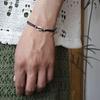 Schelp string armband (zwart)