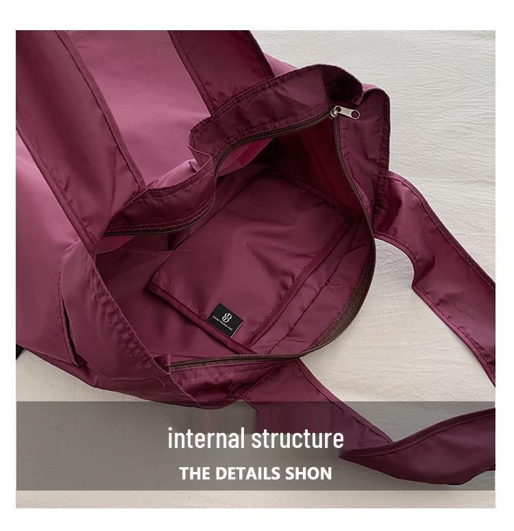 European-American Fashion Large Capacity Travel Bag - Solid Color, Nylon, Handheld or Shoulder Style for Women