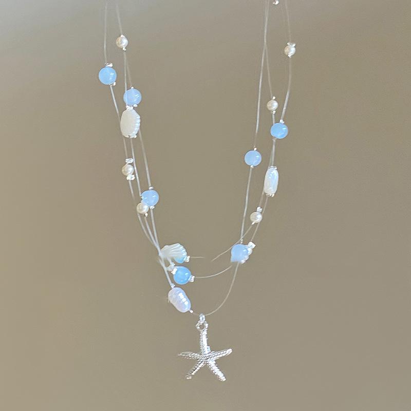 

Multi-layer broken silver spray paint shell starfish pendant necklace light luxury high sense niche design temperament versatile necklace women