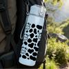 1PC Black White Cow Head Pattern 750ml Color Plastic Sports Water Bottle Leakproof Flip Straw Lid Suitable for Sports Office Home Use