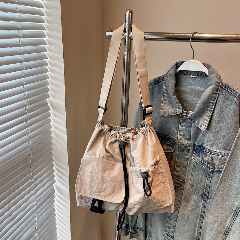 Cloth bag women's large-capacity new summer leisure niche drawstring single shoulder crossbody commuter tote bag