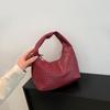 2025 French High-End Women's Fashion Woven Dumpling Handbag: Stylish, Textured, and Versatile for Commuters