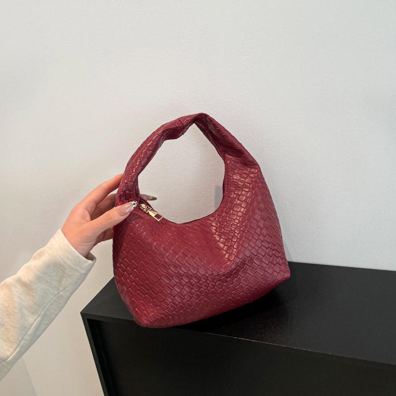 2025 French High-End Women's Fashion Woven Dumpling Handbag: Stylish, Textured, and Versatile for Commuters