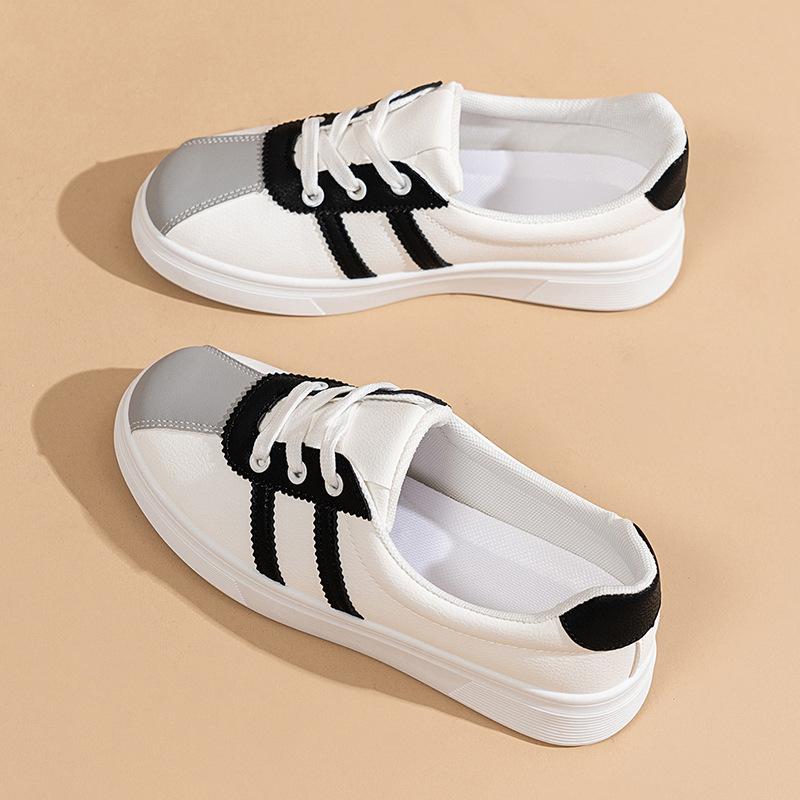 

One-pedal flat-soled single shoes for women s 2025 new summer soft-leather shallow-mouth white shoes with skirts are not tired of sports shoes 36