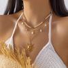 Ensemble de colliers géométriques en acier inoxydable avec cœur en perle et soleil creux pour un style vacances d'été