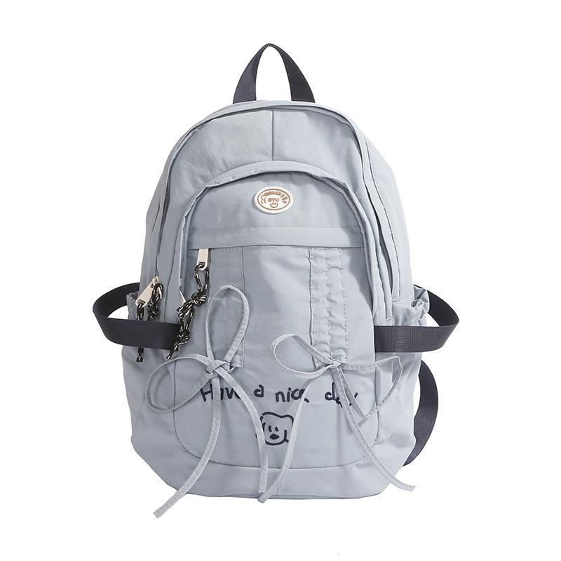 Korean Leisure CampusUse Schoolbag Female BrandNew Cute Large Capacity Nylon Cloth Bag Solid Color Small Fresh Computer Backpack