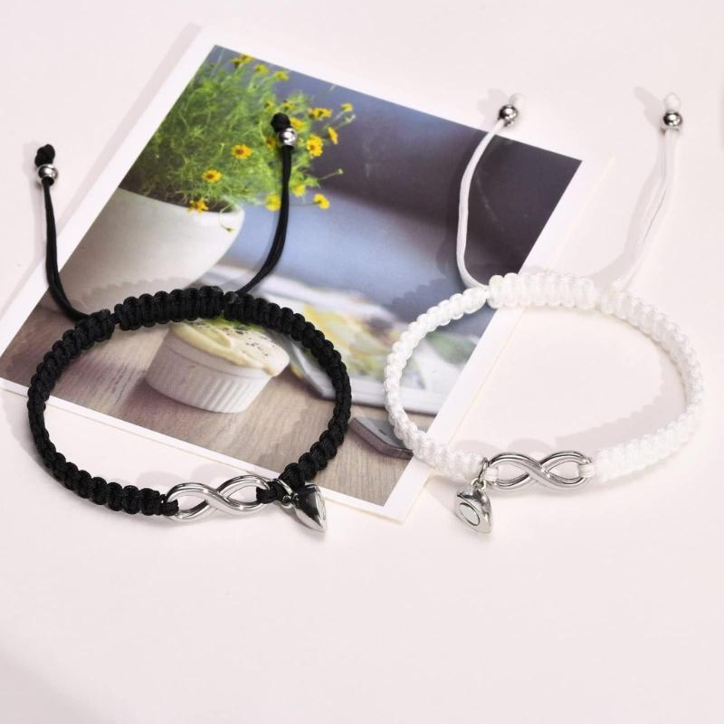 Braided Cord Bracelet Pair with a Split Heart Design, Adjustable Sliding Closures, and Smooth Stainless Steel Details