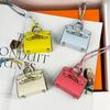 Chic Mini Bag Charm - Cute Earphone Pouch & Coin Purse with Car Keychain Decoration.