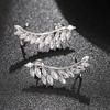 Direct supply of horse eye zircon leaf stud earrings, personalized wing shape ear bone clips, niche design versatile earrings