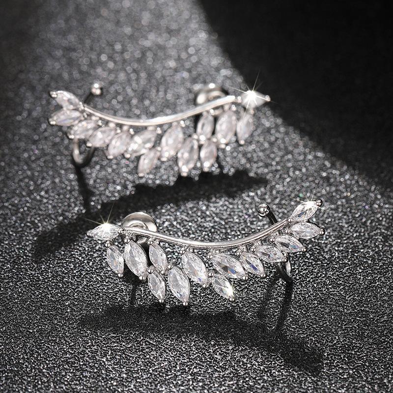 Direct supply of horse eye zircon leaf stud earrings, personalized wing shape ear bone clips, niche design versatile earrings