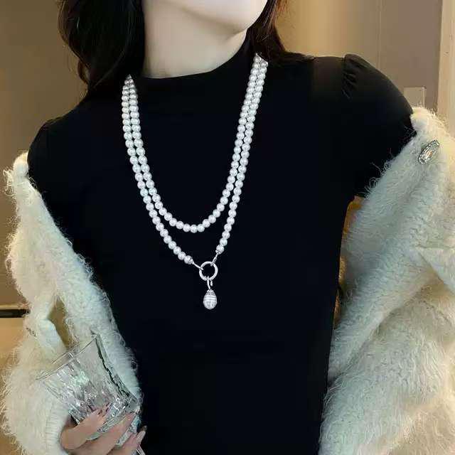 Elegante lange Perlenkette für Damen: Modische, vielseitige, mehrlagige Pulloverkette mit hochwertigem Anhänger für einen schicken und trendigen Look.