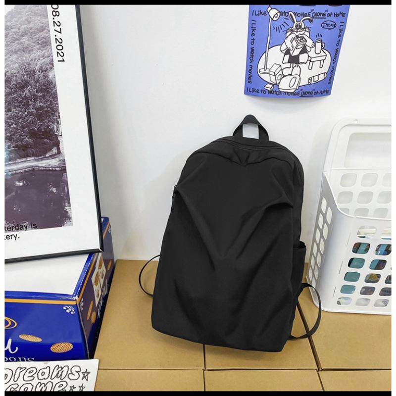 

Backpack men s large capacity personality pleats travel couple backpack simple lightweight water-repellent college student schoolbag women чорний