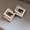 Stylish Irregular Three-Layer C-Shaped Earrings: European & American Metal Fashion Studs with a Luxurious High-End Appeal