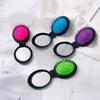 2-in-1 Folding Travel Makeup Comb with Mirror and Cushion Massage Comb