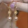 Elegantes Pendientes de Borla de Circonita Dorada: Lujo Ligero, Efecto Adelgazante, Diseño Versátil