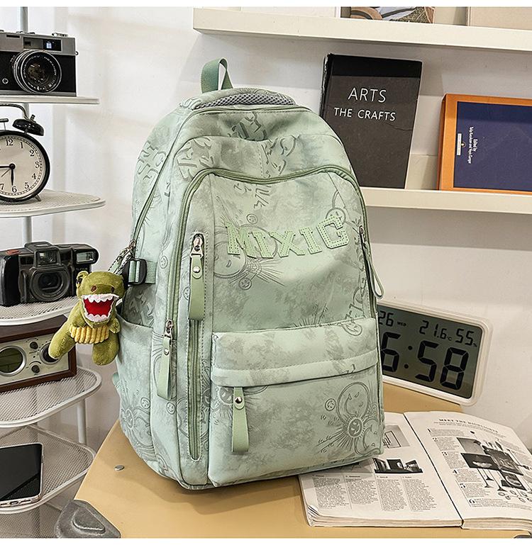 Schoolbag trendy school bag male high school student female graffiti junior high school student backpack college student large capacity lightweight