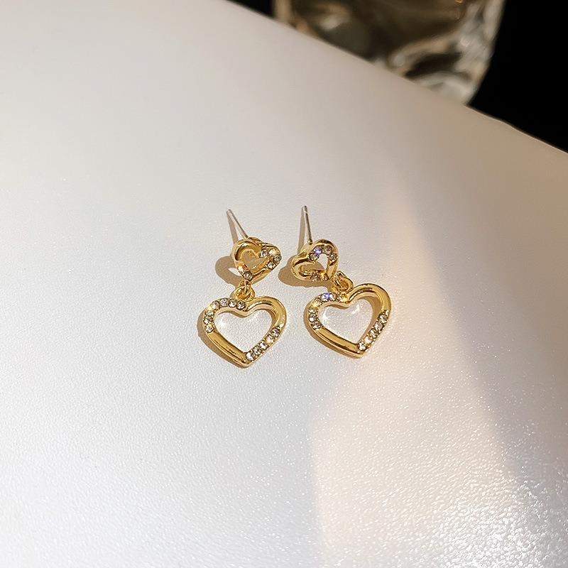 Boucles d'oreilles à longues pampilles pour femmes, style coréen Dongdaemun, design original, boucles d'oreilles polyvalentes