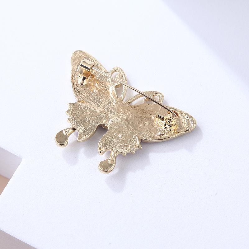 Oliedruppelend Insect Dier Mode Verfijnd Kattenoog Steen Vlinder Anti-reis Broche Speld Vrouwelijke Accessoires Broche Sieraden