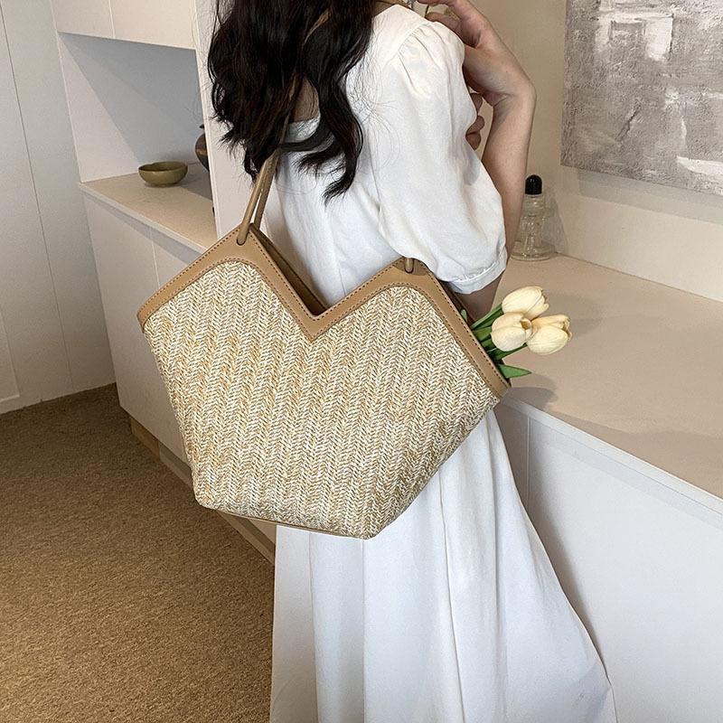 Spring and Summer Niche Straw Woven Bag Women's New Handbag Tote Bucket Bag Versatile Shoulder Armpit Bag