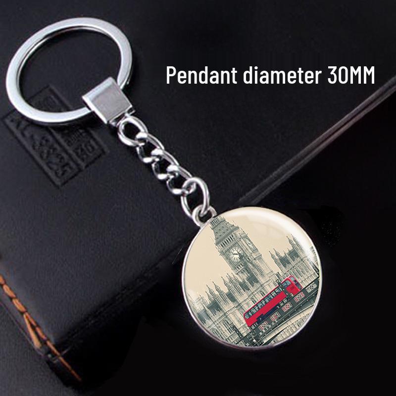 Eiffel Tower and London Icons Keychain with Red Bus, Phone Booth, and Time Gem