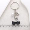 Trendy Cute Pearl Cherry Keychain for Women – Versatile Bag Ornament