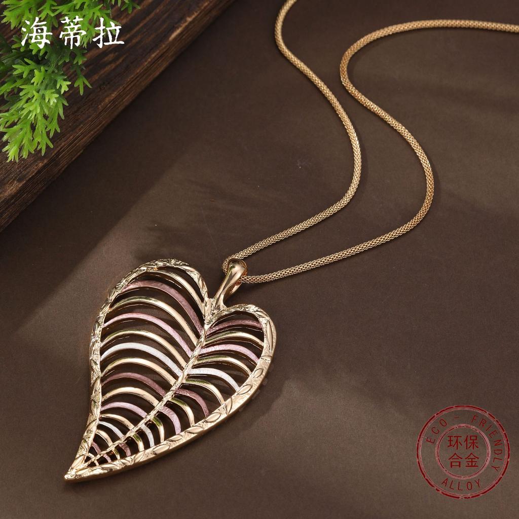 Neuer Emaille-Farbe hohler geometrischer Blatt langer Anhänger Frauen übertriebene unregelmäßige Blatt lange Halskette