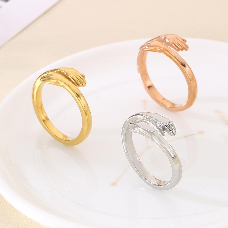 Korean Style Embrace Couple Rings - Open Hands Design.