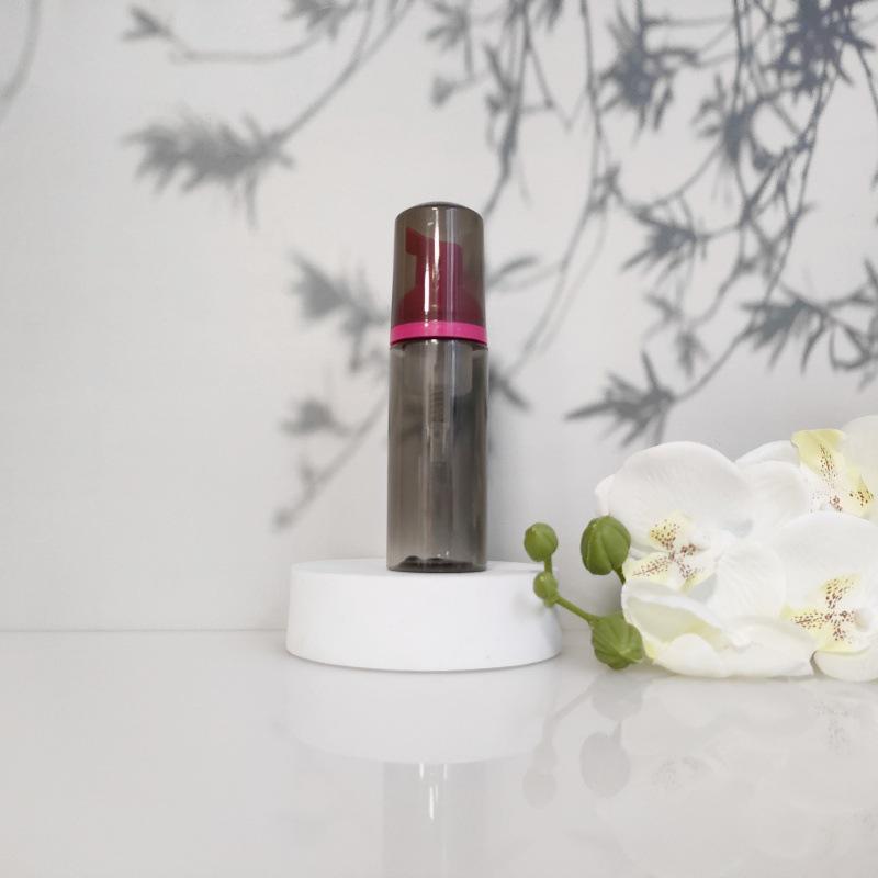 Available 60ml Transparent Black Foam Mousse Bottle for Face Wash and Travel-friendly Cosmetic Packaging.