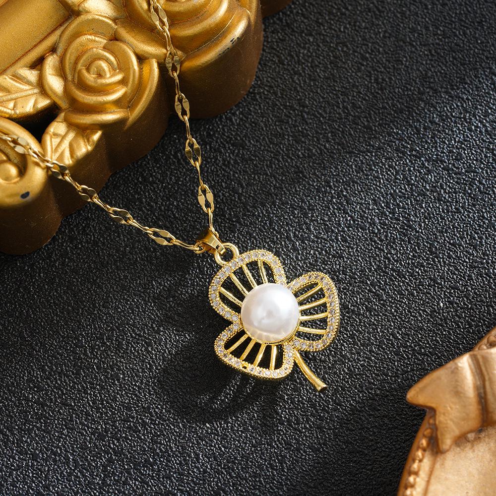 Japanese-Korean Style Four-Leaf Clover Pearl Necklace, Titanium Steel, Women s Luxury Design, High-End Clavicle Chain.