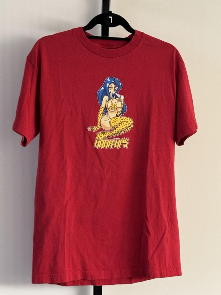 

Vintage 1990s Hookups Skate Anime Cheetah Banana Girl Tee REPRINT PA8261 Unisex T-Shirt XL
