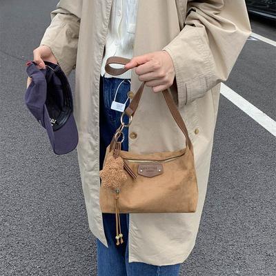 Herfst retro niche okseltas dames nieuwe mode suède bucket bag eenvoudige schoudertas