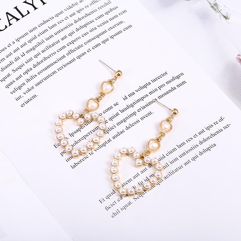 

S925 Silver Heart Pendant Earrings: Trendy Hollow Clip-Ons for Women, Ideal for Spring/Summer