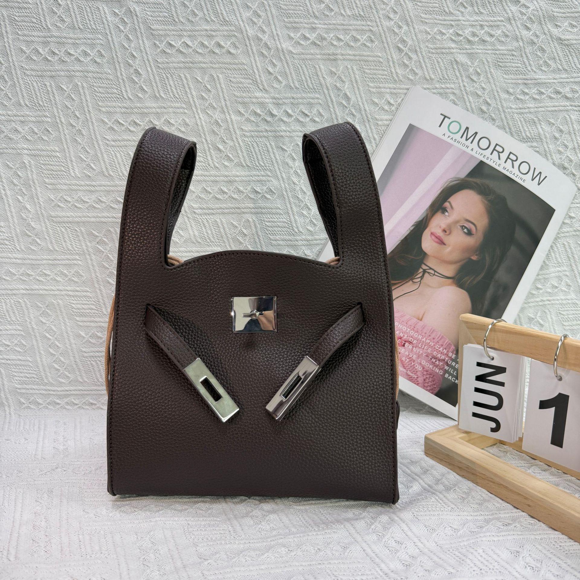 

Niche design simple casual portable commuter bag women s summer new trend versatile messenger bucket bag 21*11*18.5cm