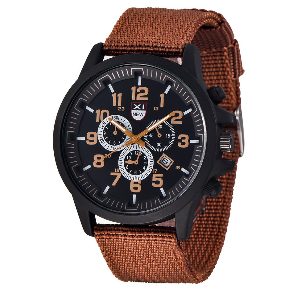 

XINEW Men s Fashion Nylon Strap Quartz Calendar Watch