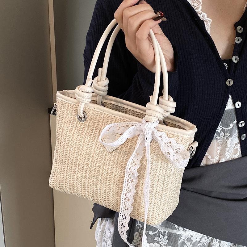 Foreign Style Contrasting Colors Straw Weaving High-end Sense Portable Bucket Bag Temperament Casual Gentle Wind Chain Messenger Bag Woman