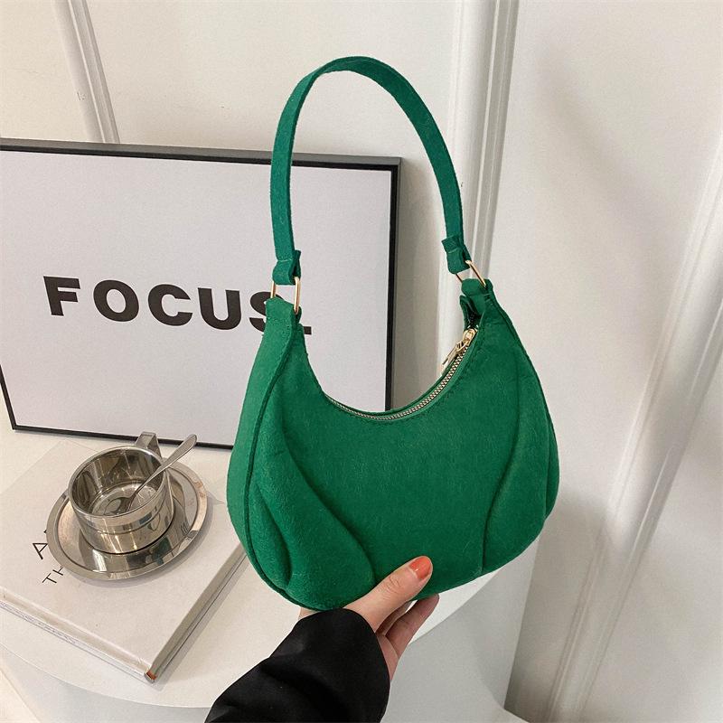 This Year's Trendy Women's Minimalist Dumpling Bag - a New Korean-style Shoulder Bag with Niche Fashion and Elegant Underarm Design.