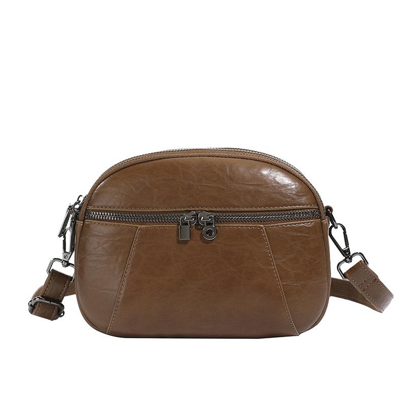 

2025 autumn and winter new retro soft leather pillow bag women s simple multi-layer storage shoulder bag commuter versatile messenger bag коричневий