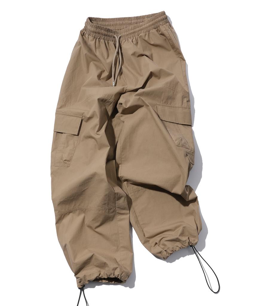 CPGN STUDIO Weite Cargohosen Beige