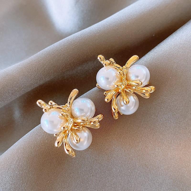 

Retro French fireworks golden pearl stud earrings temperament gentle atmosphere versatile personality earrings tide золотой